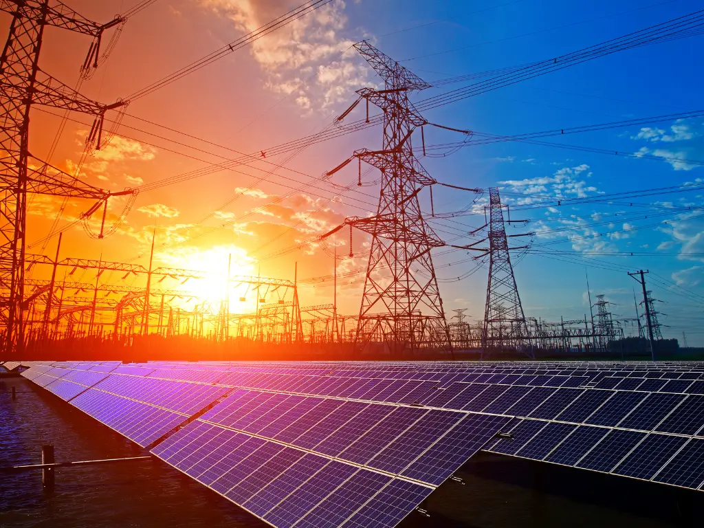 SolarLink technician installing rooftop solar panels